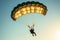 A person doing parachuting in the sky