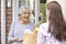 Person Doing Shopping For Elderly Neighbour