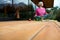 Person doing Yoga Exercise on wooden Terrace of rural Cabin