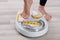 Person Feet Standing On Weighing Scale