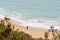 A Person Fishing On A Beach