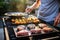 person grilling tuna steaks on rooftop barbecue