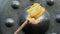 Person hand chimes gong in a temple with slow-motion