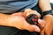 Person hand enjoy, play, relieve with the fidget cube