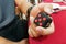 Person hand enjoy, play, relieve with the fidget cube