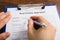 Person Hand Filling Real Estate Appraisal Form