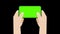 Person hand holds horizontally the smartphone and typing or touching on green screen chroma key background, The hands and