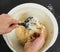 Person handling a sticky dough