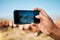 Person, hands and phone in photography, farming or animals for sustainability or natural agriculture. Closeup of farmer