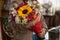 person holding bouquet of flowers,romantic details