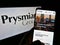 Person holding cellphone with website of Italian electric cable manufacturer Prysmian S.p.A. on screen with logo.