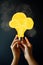 Person holding a yellow light bulb with cloud sketches AI generated