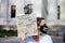 Person Holds a Sign Reading `Black Votes Matter` at a Progressive Rally