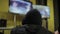 Person with hood playing video game, gamer tournament, free time and hobby