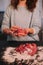 A person kneading minced meat