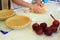 Person kneading a Pie Crust for an Apple pie