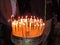 Person lighting candle in Church of the Holy Sepulchre, Jerusalem