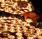 Person lights a candle during the religious ceremony