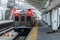 A person with luggage boards the A line lightrail, departing from Union Station bound for Denver international Airport