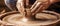 Person Making Vase on Potters Wheel