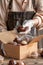 Person packaging homemade chocolates into a box.