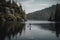 person, paddleboarding on tranquil lake, surrounded by the natural beauty of nature