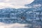 A person paddling a kayak on Skaha Lake in December.