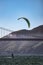 Person parasailing near the iconic Golden Gate Bridge in San Francisco, California