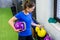 Person picking the right kettlebell for next exercise.