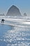 Person playing on Cannon beach