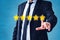 Person pointing on 5 star review, costumer feedback concept - five stars rating