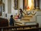 A person praying in the St. Paul Metropolitan Cathedra, Vigan City, Philippines, Aug 24,2018