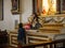 A person praying in the St. Paul Metropolitan Cathedra, Vigan City, Philippines, Aug 24,2018