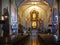 A person praying in the St. Paul Metropolitan Cathedra, Vigan City, Philippines, Aug 24,2018