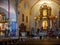 A person praying in the St. Paul Metropolitan Cathedra, Vigan City, Philippines, Aug 24,2018