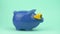 Person puts coins into money box of pig with sunglasses form