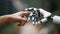 A person reaching out to touch a robot hand, AI