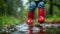 Person in Red Boots Jumping Into Puddle