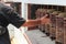 Person rotates buddhist prayer wheels