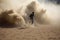 person, running away from sand explosion, with dust and smoke blowing in their wake