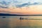 Person sailing in boat in Adriatic Sea Omis at sunset