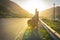 Person silhouette in the mountains with bicycle