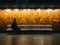 a person sitting on a bench in a subway station