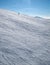 Person skiing alone in the snowbound mountains