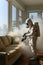 A person with special protective clothing and a gas mask spraying in a room with a sprayer for pests bugs and mites