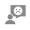 Person with speech bubble and sad face gray icon. Feedback, negative comment symbol.
