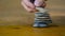 Person Stacking Rocks for Imagination and Mediation