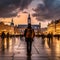 Person standing in Krakow& x27;s Old Town surrounded by famous architectural landmarks