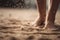 a person standing on top of a sandy beach covered in sand