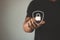 Person touching virtual button a shield with a lock symbol, concept about security, cybersecurity and protection